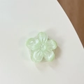 Dettaglio del supporto per telefono floreale verde chiaro con glitter e centro a stella - Supporto Sakura - Verde Chiaro Scintillante