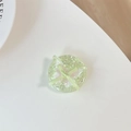 Detail of green resin phone grip with glitter, pink butterfly and bow ribbon accessory - Standard Adhesive Version - Polka Dot Glitter Glue Ribbon Bow Tie - Floral Green