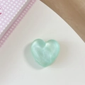 Detail view of heart-shaped phone grip in mint green with a pearl luster finish - Matte Heart Holder-Cloud Glitter Dark Green