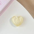 Detailed view of heart-shaped cream yellow glitter grip with pearlescent finish - Matte Heart Holder-Cloud Glitter Yellow