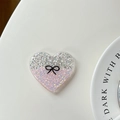 Detailansicht eines glitzernden Herz-Handyhalters mit Pailletten und Schleifendetail - Harz Rosa Farbverlauf Herz Schleife / Klebstoff