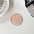 Macro shot of pink glitter phone grip with elegant pearl border on white desktop - Orange (Pearl Magnetic Macaron Sequin)