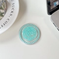 Detailed view of mint green glitter phone socket with pearl rim on white desk - Green (Pearl Magnetic Macaron Sequin)