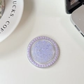 Macro shot of purple glitter phone grip stand with a ring of faux pearls on white desk - Purple (Pearl Magnetic Macaron Sequin)