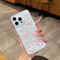 Detail of light blue iPhone case with 3D pink butterfly and white pearl bow decoration - iPhone 7/8/SE 2020 / Pink Butterfly (Pearl Bowtie Glitter)