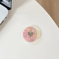 Macro shot of heart-shaped mirror phone grip with colorful polka dots on pink base - Transparent Epoxy - Colorful Polka Dot Heart - Holographic