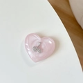 Detail van de roze glitter hart telefoonhouder met zilveren strass kersmotief - Roze Glitter (3D Hart Strass Kers)