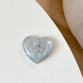 Macro detail of heart-shaped phone grip with glitter marble texture and rhinestone cherry - Silver Gray Glitter (3D Heart Rhinestone Cherry)
