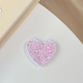 Close-up of pink heart-shaped flip mirror with glitter finish on a minimal surface - Flip Heart Mirror - High Glitter / Pink