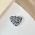 Close-up of heart-shaped folding makeup mirror with colorful glitter and white plastic frame - Flip Heart Mirror - High Glitter / Black