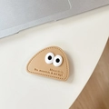 Detail view of khaki leather phone grip with mountain embossing and cute large 3D eyes decoration - Transparent Bracket-Leather Mountain (Eyes)-Khaki