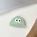 Close-up of light green leather phone stand with eye details and stitched edges - Transparent Bracket-Leather Mountain (Eyes)-Green