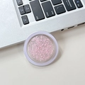 Detail of round phone socket holder with pink hexagonal glitter and purple edges - Pink