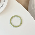 Detail view of transparent MagSafe phone grip base with Morandi green inner ring insert - Transparent - Matcha Green Edge