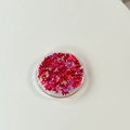 Macro shot of butterfly glitter sequins in a round container for phone stand DIY projects - Gradient Butterfly - Laser Rose Red