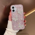 Detail of pink rhinestone phone case with 3D butterflies and pearls for iPhone models - Pink / iPhone 16e