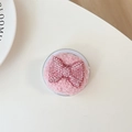 Detailed close-up of pink plush phone grip with luxury rhinestone bow in packaging - Plush Rhinestone Flat Bowknot / Pink