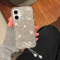 Close-up of luxury rhinestone phone case with bow pendant and pearlescent droplets - Rhinestone Pearl Bowknot Pendant / White / iPhone 7/8/SE 2020