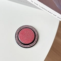 Top view of pink glitter and rhinestone-encrusted round Magsafe phone grip on a white desk - Gemstone Glitter Magnetic - Pink