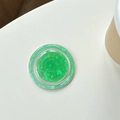 Detail of green shell texture phone grip with MagSafe magnetic circular foldable stand - Iridescent Jewel Green
