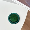 Macro shot of emerald green MagSafe phone socket with glitter and crystal rhinestone inlay - Gemstone Glitter Magnetic - Dark Green