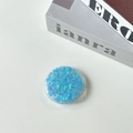 Detail of round phone socket holder filled with glittering blue heart-shaped sequins - Candy Heart / Blue