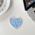 Dettaglio specchio tascabile a cuore pieghevole con paillettes blu su tavolo bianco - Paillettes Scintillanti Blu (701562)