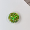 Round phone grip with green butterfly sequins inside a clear resin finish - Gradient Butterfly - Laser Green