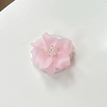 Detailed top view of a pink floral phone grip with translucent petals and bead center - Magnetic Camellia / Pink
