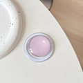 Top view of a round crystal glass Magsafe phone grip with pink and purple center - Pink Purple