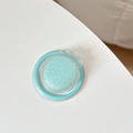 Detail of mint green strawberry MagSafe phone grip with matte textured surface - Magnetic-Sandwich Strawberry-Light Green