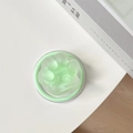 Primer plano del soporte magnético de pata de gato verde menta con acabado mate suave - Verde fruta