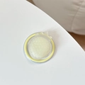 Detail of 3D strawberry MagSafe phone grip with textured surface and transparent base - Magnetic-Sandwich Strawberry-Yellow