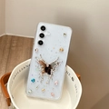 Detail of glitter phone case with liquid metal butterfly and colorful rhinestones - Butterfly Mirror / Samsung A14