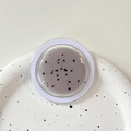 Detail of glitter magnetic phone socket showing gray-purple gel texture and tiny dark particles - Magnetic Morandi Ink Splash Coffee Grey