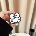 Detail of a minimalist black and white cartoon frog phone grip held in a hand - Black
