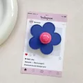 Detail of flower shaped phone grip in dark blue faux leather with pink center bead - (Magnetic) 3D Leather Flower - Royal Blue