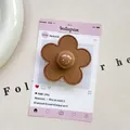 Detail of flower phone grip made of brown leather with fine stitching and bead center - (Magnetic) 3D Leather Flower - Brown