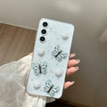 Detail of transparent Samsung case with 3D blue butterflies, white roses and silver glitter - Ultra-thin Starry Epoxy Rose Simulation Butterfly / Blue / Samsung A27-5G (Thickened Case)