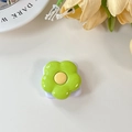 Detail of flower-shaped folding mirror and telescopic phone grip in light green color - Fruit Green