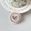 Macro view of pink rhinestone phone grip with silver heart and Gift For You text - Concave-Convex Heart - Pink