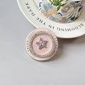 Detailed macro view of a pink star crystal phone socket with elegant rhinestone border - Pink Star - Pink