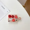 Detail shot of mini cutting board with tomato models and small knife phone grip - Transparent Stand - Tomato Cutting Board