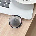 Macro shot of translucent dark grey heart-shaped phone grip with Good Luck engraving - Magnetic Sandwich Heart / Black