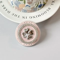 Macro shot of pink foldable phone grip with silver clover and sparkling rhinestones - Four-Leaf Clover - Pink