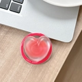 Close-up of translucent red heart phone socket with Good Luck text on a desk - Magnetic Sandwich Heart / Red