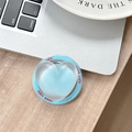 Detail shot of light blue matte heart phone grip with Good Luck text on wood surface - Magnetic Sandwich Heart / Blue