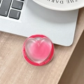 Detail of pink heart phone grip with Good Luck text on a stylish office desk setup - Magnetic Sandwich Heart / Rose Red