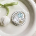 Detalle de soporte para móvil en forma de corazón con estrellas azules y perlas - Magnético - Estrella Azul