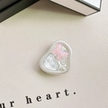 Macro shot of pink glitter butterfly phone grip with pearl and shell accents - Adhesive Stand - Pearlescent Butterfly - Pink